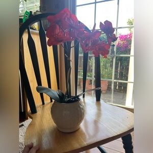 Faux fake red flowers with pot